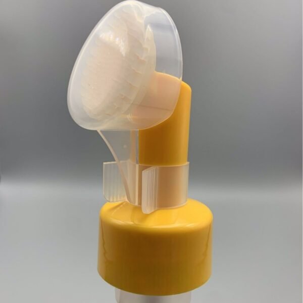 foam pump for facial cleansing mousse with a silicone soft brush head and a cover suitable for down filled clothes and shoes